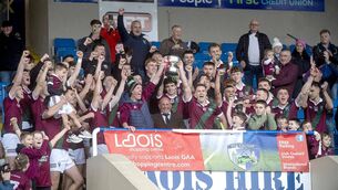 <p>The Jack Delaney Cup is raised by the Portarlington captain Paddy O'Sullivan after they captured the Laois senior football title seeing off the Courtwood challenge at Laois Hire O'Moore Park on Sunday Photo: Denis Byrne</p> <p>The Jack Delaney Cup is raised by the Portarlington captain Paddy O'Sullivan after they captured the Laois senior football title seeing off the Courtwood challenge at Laois Hire O'Moore Park on Sunday Photo: Denis Byrne</p>
