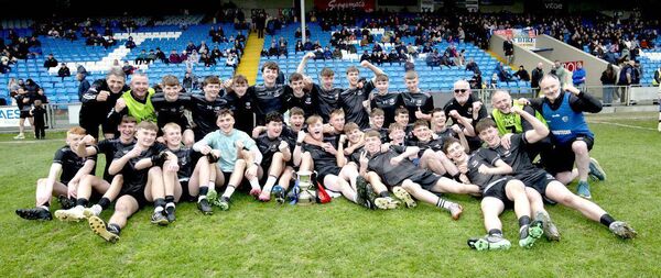 The Mountmellick Parish Gaels team and management celebrate their Minor Football Championship title win at the expense of Na Fianna Óg at Laois Hire O'Moore Park on Sunday Photo: Denis Byrne The Mountmellick Parish Gaels team and management celebrate their Minor Football Championship title win at the expense of Na Fianna Óg at Laois Hire O'Moore Park on Sunday Photo: Denis Byrne