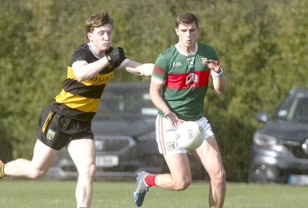 Dylan Murphy (Graiguecullen) securing this ball as James Doyle (The Heath) challenges Photo Denis Byrne Dylan Murphy (Graiguecullen) securing this ball as James Doyle (The Heath) challenges Photo Denis Byrne