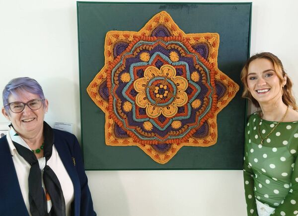 Fibre artists Tina and Courtney Jean Murray pictured by Tina's crochet piece titled A Study in Symmetry at their joint launch in Mountmellick Library Fibre artists Tina and Courtney Jean Murray pictured by Tina's crochet piece titled A Study in Symmetry at their joint launch in Mountmellick Library