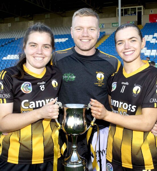 Luisne, Liam and Grainne Delaney with the Intermediate Camogie Championship trophy Photo: Denis Byrne Luisne, Liam and Grainne Delaney with the Intermediate Camogie Championship trophy Photo: Denis Byrne