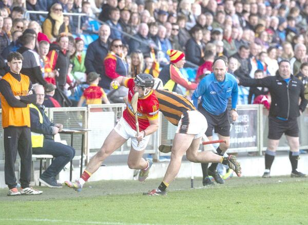Mark Downey (Harps) rides this challenge in the SHC final Photo: Denis Byrne Mark Downey (Harps) rides this challenge in the SHC final Photo: Denis Byrne