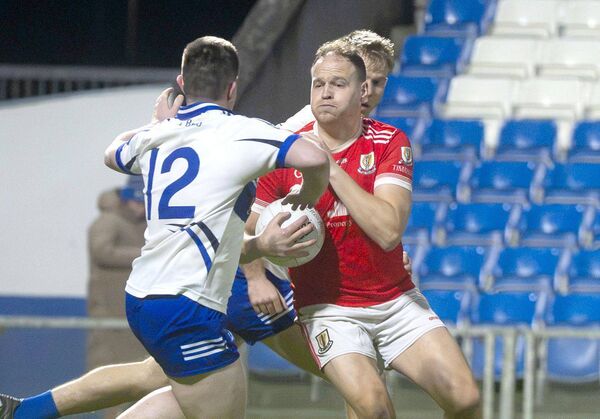 Padraig Kelly (Timahoe) prepares for contact with Liam Corcoran (St Brigid's) on Friday night Photo: Denis Byrne Padraig Kelly (Timahoe) prepares for contact with Liam Corcoran (St Brigid's) on Friday night Photo: Denis Byrne